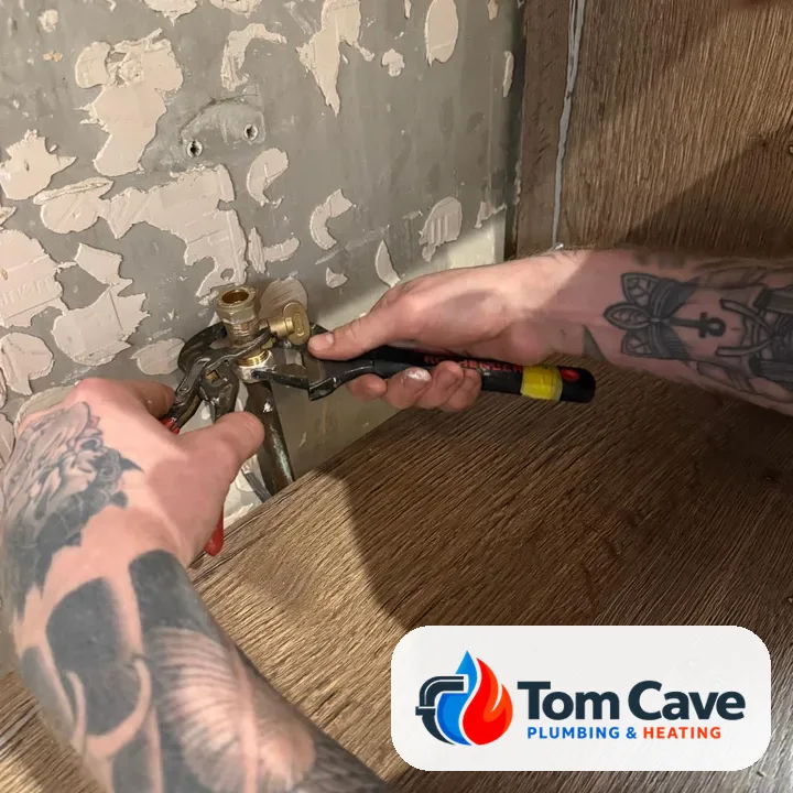 Connecting the gas supply and isolation valve under the worktop