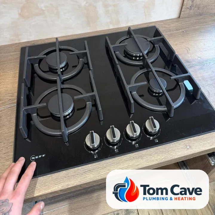 New Neff four-burner gas hob fitted in an oak-effect worktop